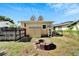 Backyard view showcasing a shed and fire pit at 2905 N 13Th St, Tampa, FL 33605