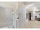 Clean bathroom with white vanity, bathtub, and shower at 2905 N 13Th St, Tampa, FL 33605