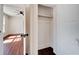 Bedroom closet with hardwood floors and shelving at 2905 N 13Th St, Tampa, FL 33605