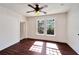 Well-lit bedroom with hardwood floors, ceiling fan, and window at 2905 N 13Th St, Tampa, FL 33605