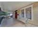 Inviting front porch with benches and a view of the street at 2905 N 13Th St, Tampa, FL 33605