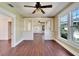 Open living space with hardwood floors and a view of the entryway at 2905 N 13Th St, Tampa, FL 33605