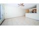 Bright living room with tile floors and kitchen bar at 4144 56Th N St # 810, Kenneth City, FL 33709