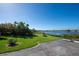 Backyard with grassy area and waterfront access at 50 Harbor View Ln # 12A, Largo, FL 33770