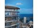 Luxury high-rise with wrap-around terraces overlooking the bay with seating, dining, and city views at 400 Central Ave # 3909, St Petersburg, FL 33701