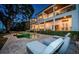 Exterior shot of backyard with pool and lounge chairs at 1100 Monterey Ne Blvd, St Petersburg, FL 33704
