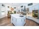 Bright kitchen with a center island, stainless steel appliances, and custom cabinetry at 1100 Monterey Ne Blvd, St Petersburg, FL 33704