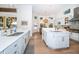 Bright kitchen with a center island, stainless steel appliances, and abundant natural light at 1100 Monterey Ne Blvd, St Petersburg, FL 33704
