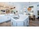 Bright open kitchen with a center island, stainless steel appliances, and custom cabinetry at 1100 Monterey Ne Blvd, St Petersburg, FL 33704