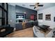 Living room with built in wet bar, plenty of cabinets, countertop space, and tv at 1100 Monterey Ne Blvd, St Petersburg, FL 33704