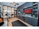 Entertainers living room featuring a built in wet bar with sports themed tvs at 1100 Monterey Ne Blvd, St Petersburg, FL 33704