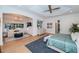 Open main bedroom with sitting area, large windows, tray ceiling, and stylish furnishings at 1100 Monterey Ne Blvd, St Petersburg, FL 33704