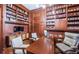 Executive office featuring wooden accents, custom cabinets, and lots of shelf storage at 1100 Monterey Ne Blvd, St Petersburg, FL 33704