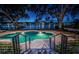 Stunning backyard features an in-ground pool with beautiful landscaping and waterfront views at 1100 Monterey Ne Blvd, St Petersburg, FL 33704