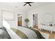 Bright main bedroom featuring a bathroom and walk-in closet at 1001 E New Orleans Ave, Tampa, FL 33603