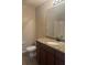 Bathroom with granite countertop and updated vanity at 10235 Villa Palazzo Ct, Tampa, FL 33615