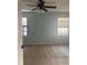 Spacious bedroom with carpeted floors and ceiling fan at 10235 Villa Palazzo Ct, Tampa, FL 33615
