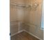 Large walk-in closet with wire shelving at 10235 Villa Palazzo Ct, Tampa, FL 33615