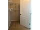 Walk-in closet with wire shelving at 10235 Villa Palazzo Ct, Tampa, FL 33615