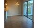 Bright dining area with sliding glass doors leading to backyard at 10235 Villa Palazzo Ct, Tampa, FL 33615
