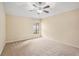 Bedroom with ceiling fan, neutral walls, and carpeted flooring at 12320 Ballentrae Forest Dr, Riverview, FL 33579