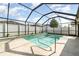 Refreshing screened pool perfect for relaxation at 12320 Ballentrae Forest Dr, Riverview, FL 33579