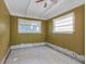 Small bedroom with yellow walls and tiled floors at 7620 Dennison Dr, Tampa, FL 33619