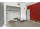 Unfinished bedroom with tiled floors and closet at 7620 Dennison Dr, Tampa, FL 33619