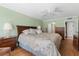 Spacious bedroom with king-size bed and wood furniture at 1460 Gulf Blvd # 210, Clearwater Beach, FL 33767