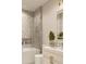 Modern bathroom features marble tile, soaking tub with shower, and stylish vanity with square mirror at 7176 S Shore Dr, South Pasadena, FL 33707