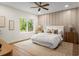 Spacious bedroom with a king-size bed and an accent wall at 1919 E Hamilton Ave, Tampa, FL 33610