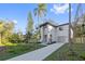 Modern two-story home with driveway and landscaped front yard at 1919 E Hamilton Ave, Tampa, FL 33610