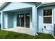 Sliding glass doors leading to a covered back patio at 2509 Mario Way, Clearwater, FL 33761