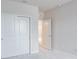 Spacious bedroom with double door closet and neutral walls at 2509 Mario Way, Clearwater, FL 33761