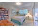 Bedroom with bookshelf and window seating at 8012 N Lynn Ave, Tampa, FL 33604