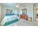 Spacious bedroom with dresser and ceiling fan at 8012 N Lynn Ave, Tampa, FL 33604