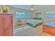 Bright bedroom with ample natural light and built-in dresser at 8012 N Lynn Ave, Tampa, FL 33604