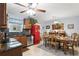 Elegant dining area with antique table and chairs, adjacent to the kitchen at 860 25Th N Ave, St Petersburg, FL 33704