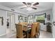 Dining room with wood table, chairs, and view to bedroom at 860 25Th N Ave, St Petersburg, FL 33704