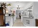 Modern kitchen with granite countertops, stainless steel appliances, and white cabinets at 860 25Th N Ave, St Petersburg, FL 33704