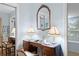 Elegant vanity area with antique wooden desk and ornate mirror at 860 25Th N Ave, St Petersburg, FL 33704