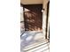 Spacious balcony with storage and a view of the parking lot at 11701 Raintree Village Blvd # C, Temple Terrace, FL 33617