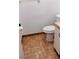 Simple bathroom with tiled floor and toilet at 11701 Raintree Village Blvd # C, Temple Terrace, FL 33617