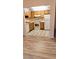 Small kitchen with light wood cabinets and white appliances at 11701 Raintree Village Blvd # C, Temple Terrace, FL 33617