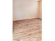 Living room with light walls and wood-look flooring at 11701 Raintree Village Blvd # C, Temple Terrace, FL 33617