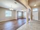 Spacious dining room with hardwood floors and access to other areas at 12403 Ballentrae Forest Dr, Riverview, FL 33579