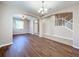 Spacious dining room featuring hardwood floors and an open layout at 12403 Ballentrae Forest Dr, Riverview, FL 33579