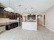 Spacious kitchen, granite counters, dark wood cabinets at 12403 Ballentrae Forest Dr, Riverview, FL 33579