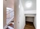 Small under-stairs storage closet with wood-look floors at 12403 Ballentrae Forest Dr, Riverview, FL 33579