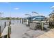 Private boat dock with lift for convenient boat access at 10088 Paradise Blvd, Treasure Island, FL 33706